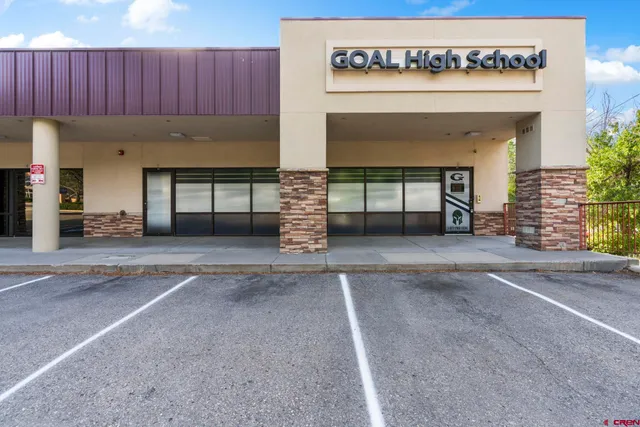 a room with furniture and a flat screen tv