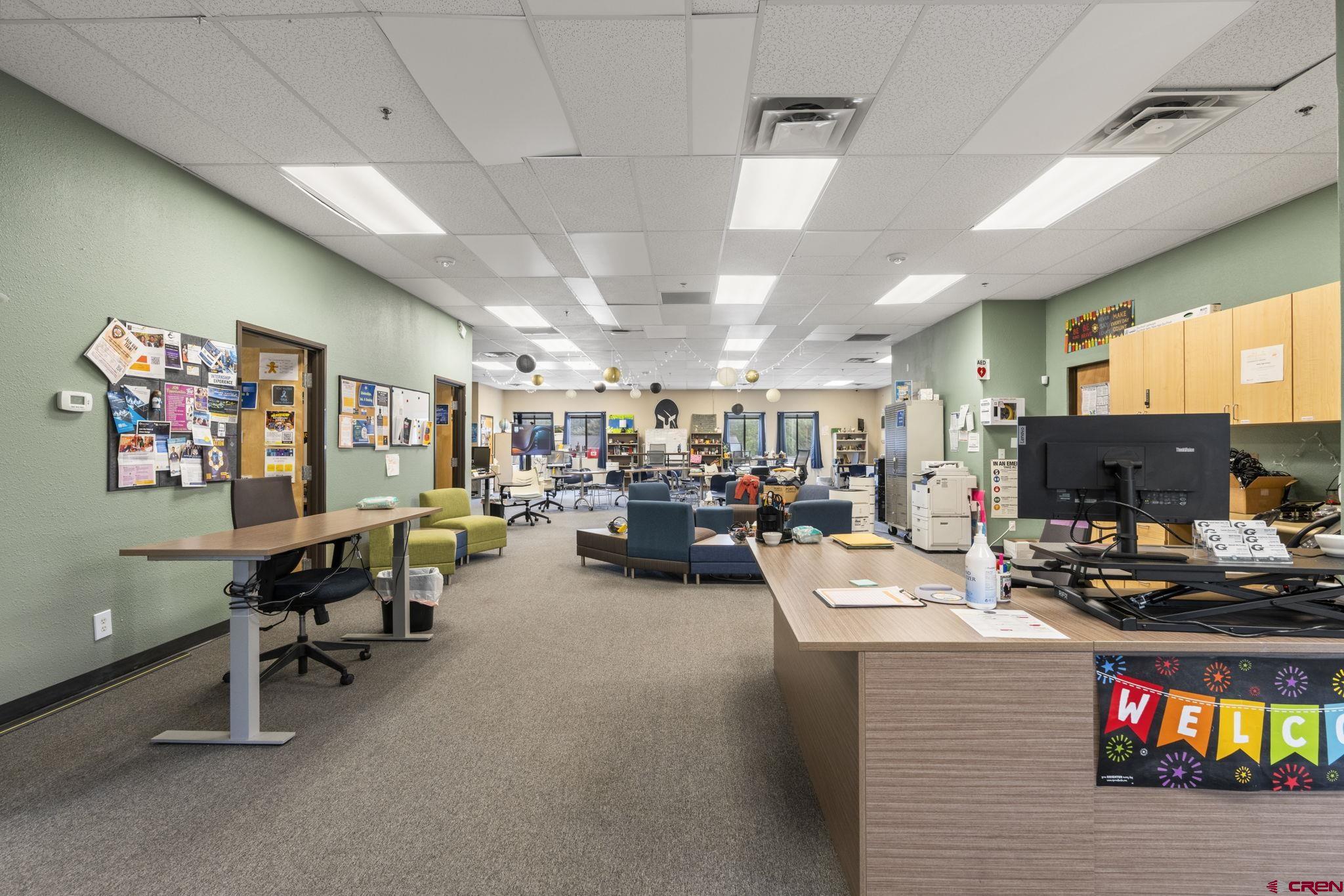 3206 Main Avenue Durango, CO 81301 - Photo 37 of 45 a room with furniture and a flat screen tv