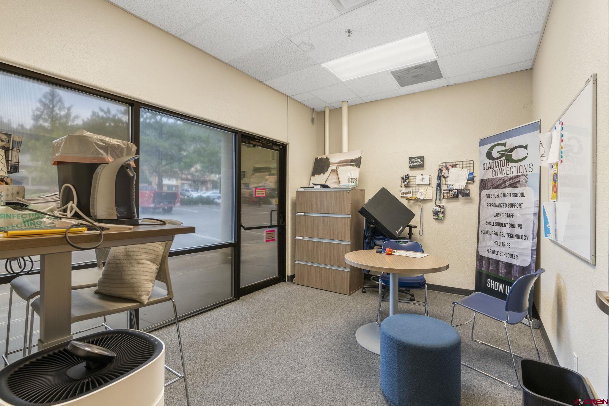 3206 Main Avenue Durango, CO 81301 - Photo 39 of 45 a room with furniture a rug and a table