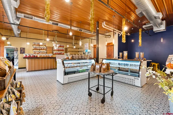 a outdoor space with lots of tables and chairs