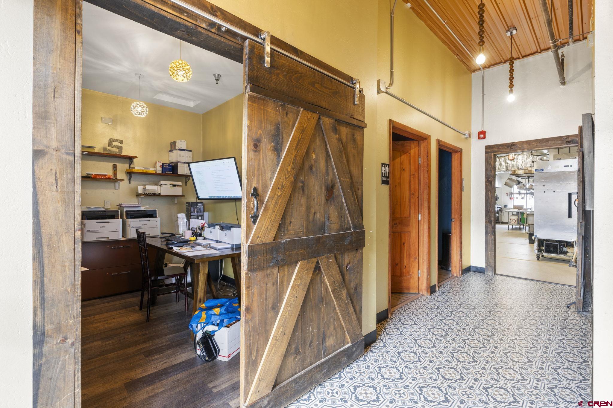 3206 Main Avenue Durango, CO 81301 - Photo 7 of 45 a view of a dining room with a table and chairs