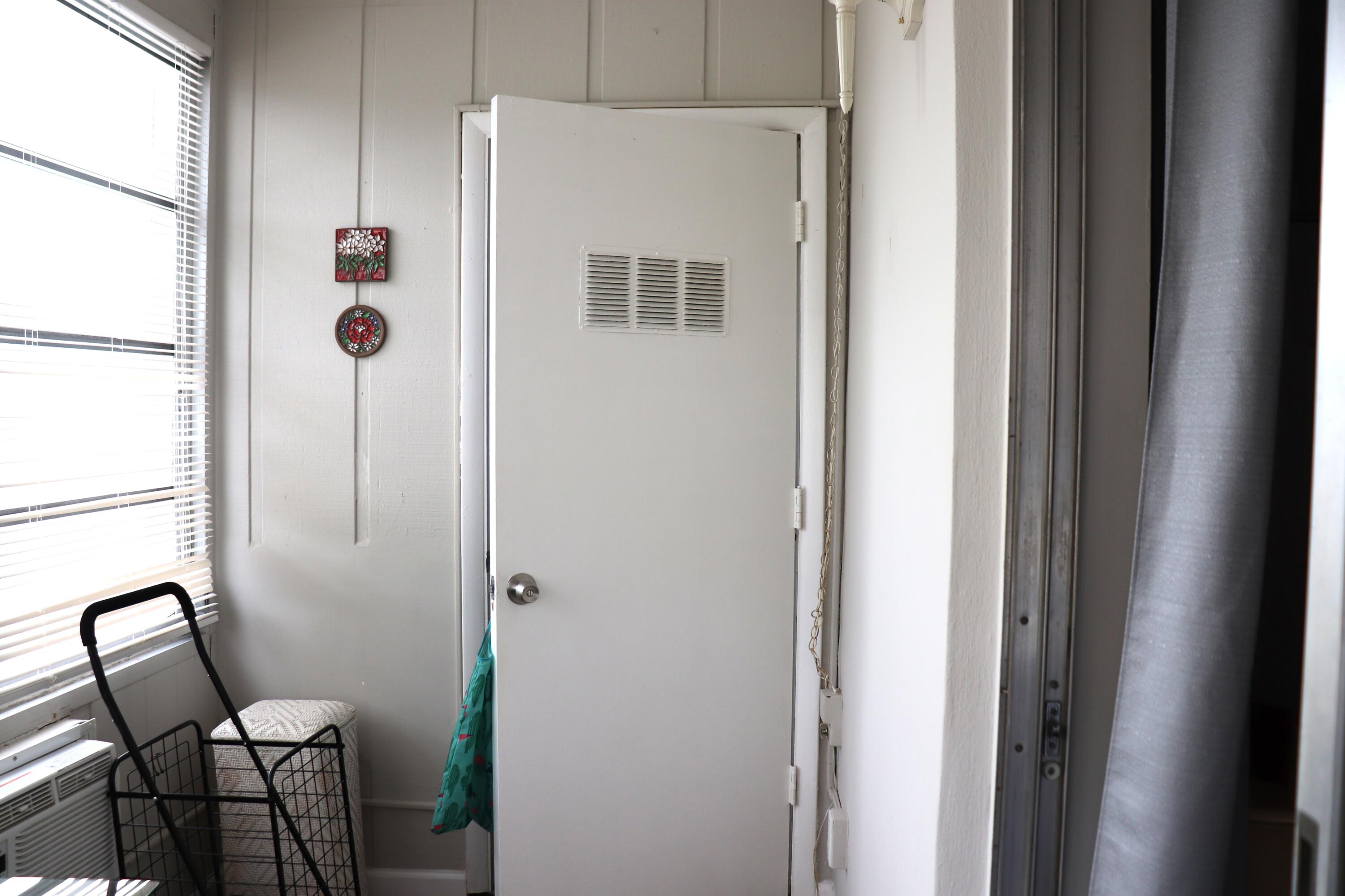 801 Flanders South, Unit Q Delray Beach, FL 33484 - Photo 13 of 15 a bathroom with a mirror