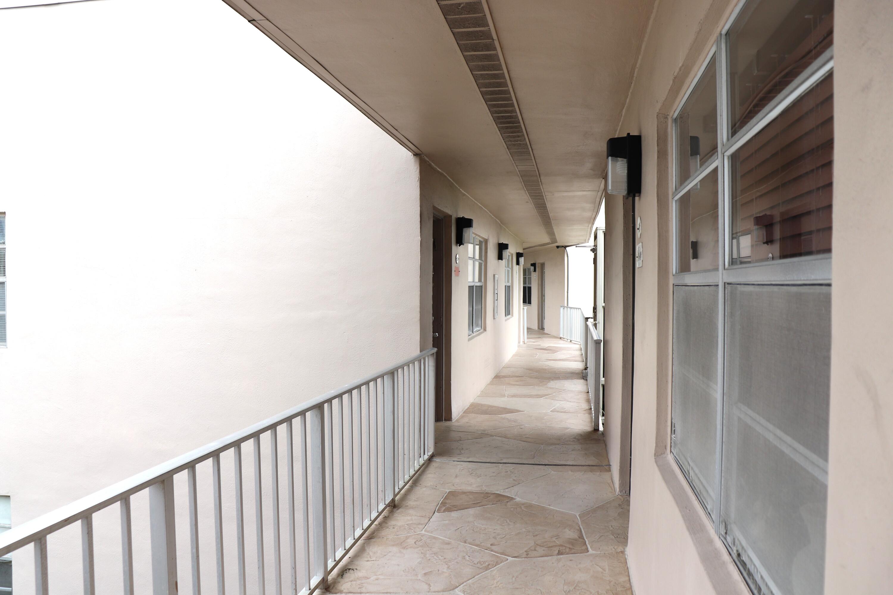 801 Flanders South, Unit Q Delray Beach, FL 33484 - Photo 15 of 15 a view of a hallway