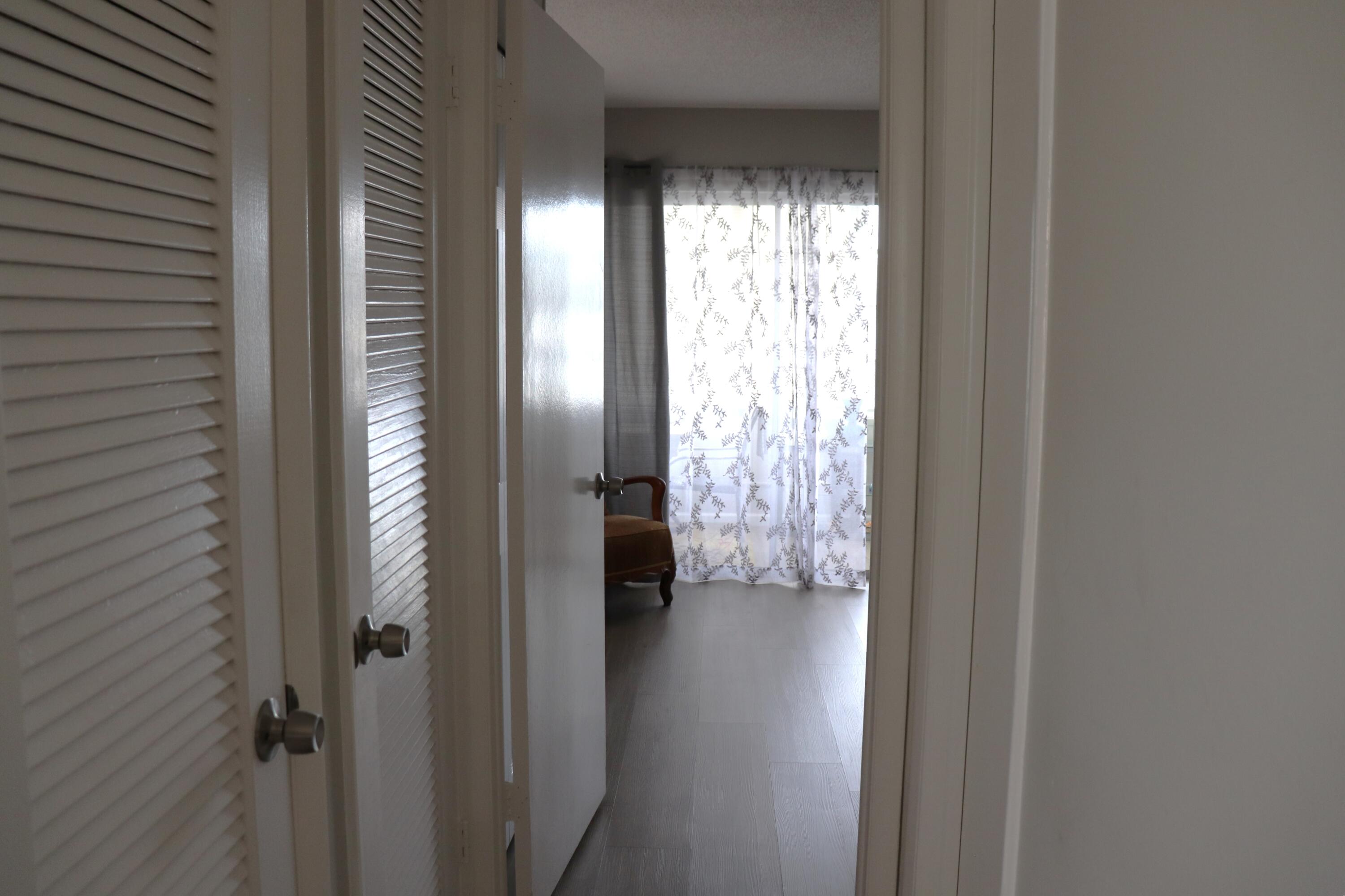 801 Flanders South, Unit Q Delray Beach, FL 33484 - Photo 7 of 15 a view of entryway with window