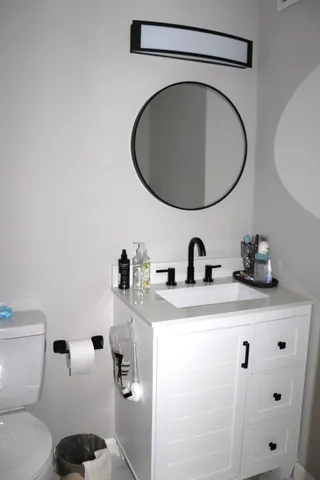 a bathroom with a sink and a toilet