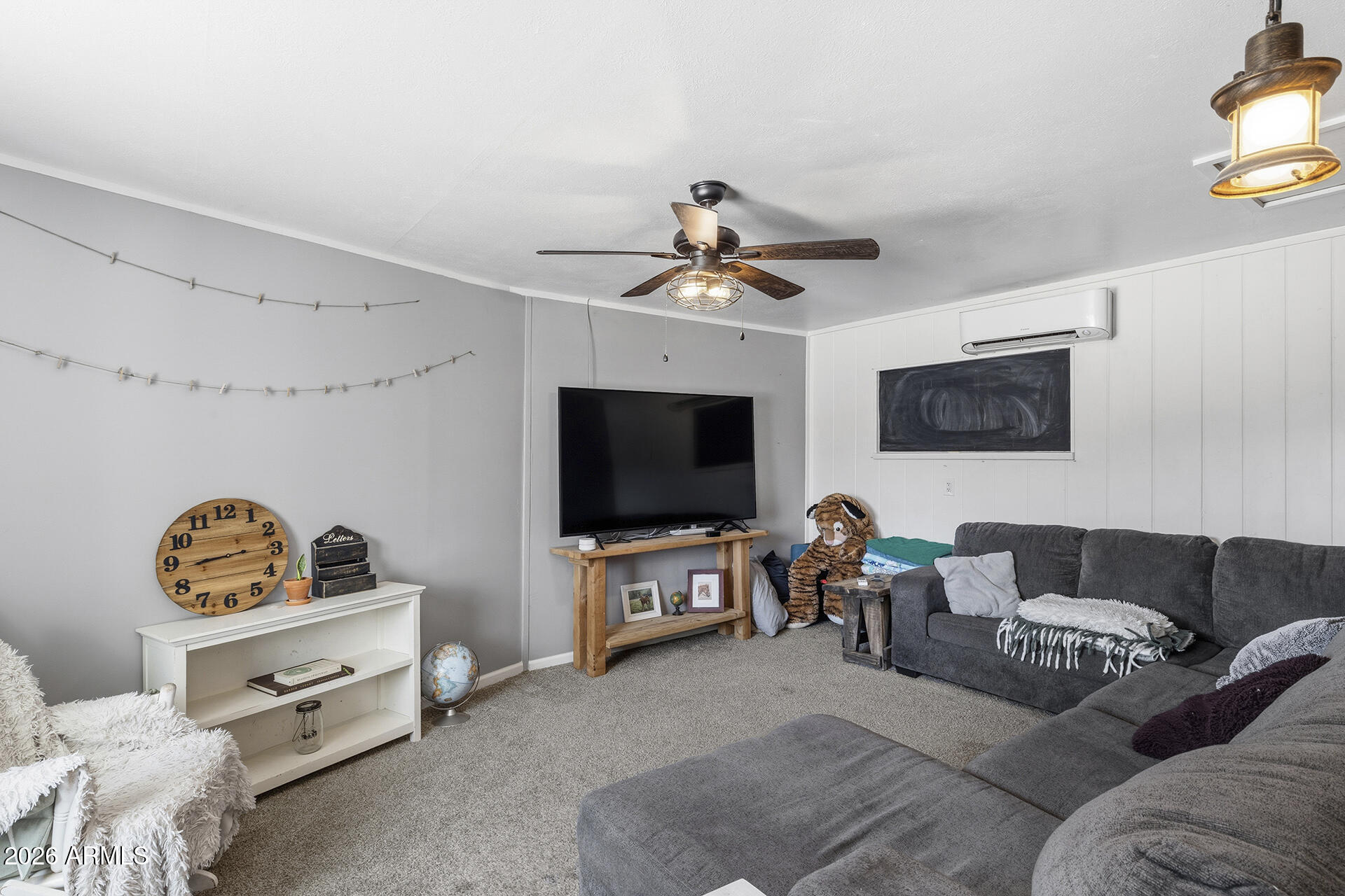 5228 North 15th Street Phoenix, AZ 85014 - Photo 24 of 96 a living room with furniture and a flat screen tv
