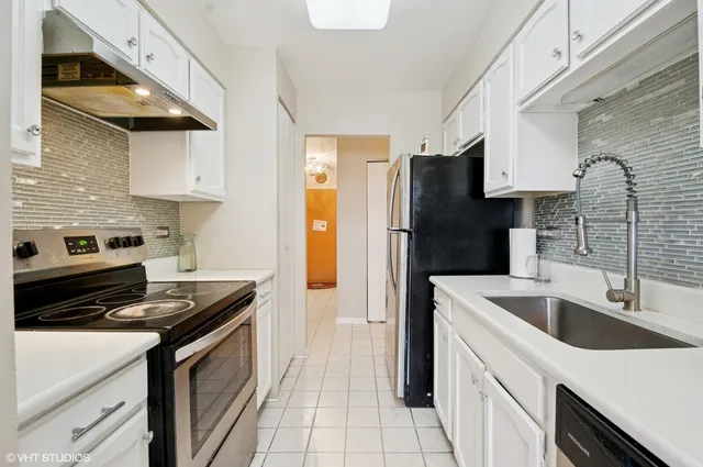 a front view of a house with outdoor seating