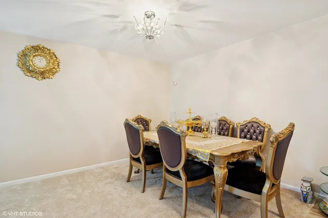 a living room with furniture a air conditioner vent and a window