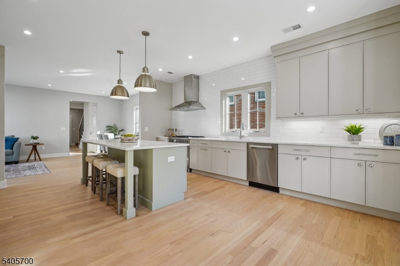 8 Willow Street Millburn, NJ 07041 - Photo 12 of 45 a kitchen with a sink window and cabinets