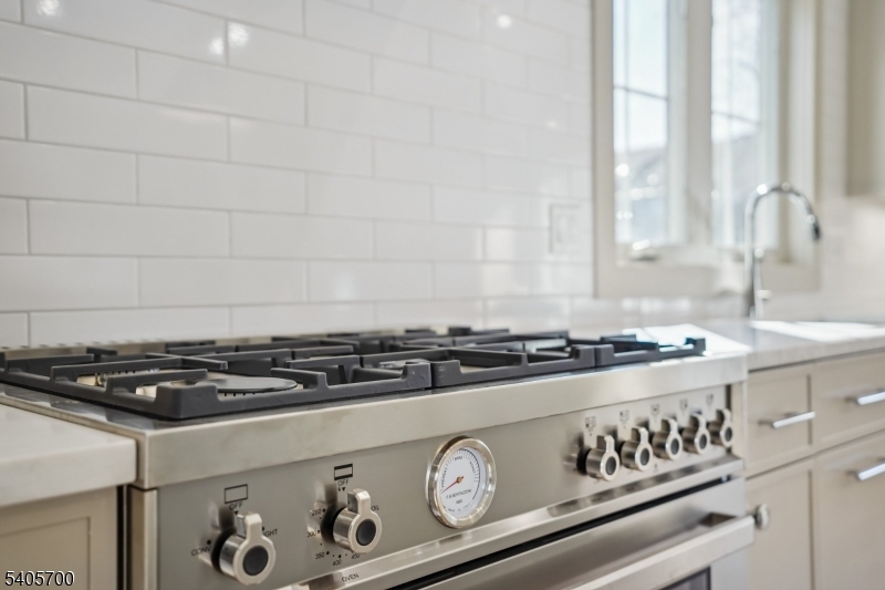 8 Willow Street Millburn, NJ 07041 - Photo 15 of 45 a close view of stove top oven