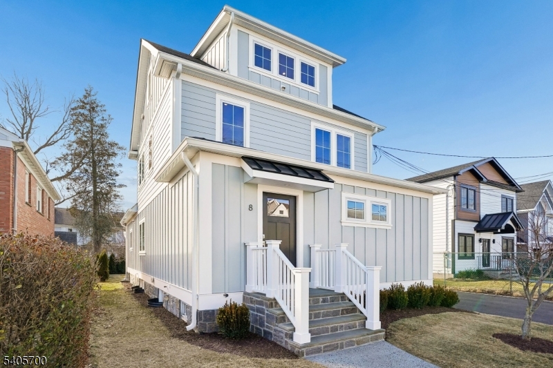 8 Willow Street Millburn, NJ 07041 - Photo 2 of 45 a front view of a house with a yard