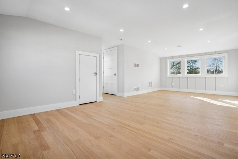 8 Willow Street Millburn, NJ 07041 - Photo 21 of 45 a view of empty room with wooden floor