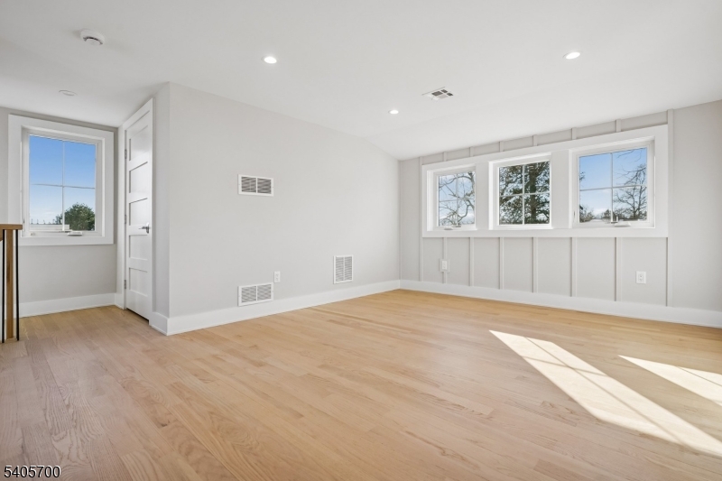 8 Willow Street Millburn, NJ 07041 - Photo 22 of 45 a view of an empty room with a window