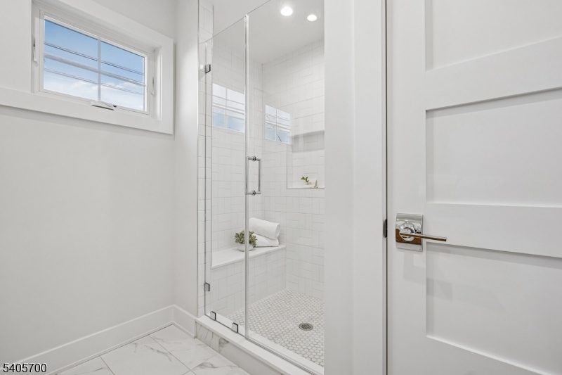 8 Willow Street Millburn, NJ 07041 - Photo 36 of 45 a bathroom with a shower