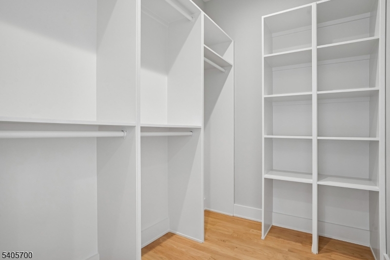 8 Willow Street Millburn, NJ 07041 - Photo 37 of 45 a view of an empty walk in closet
