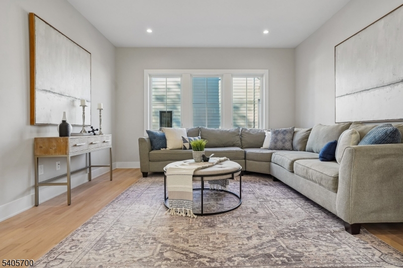 8 Willow Street Millburn, NJ 07041 - Photo 4 of 45 a living room with furniture and a large window