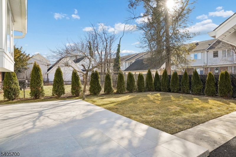 8 Willow Street Millburn, NJ 07041 - Photo 42 of 45 a view of a backyard with large trees