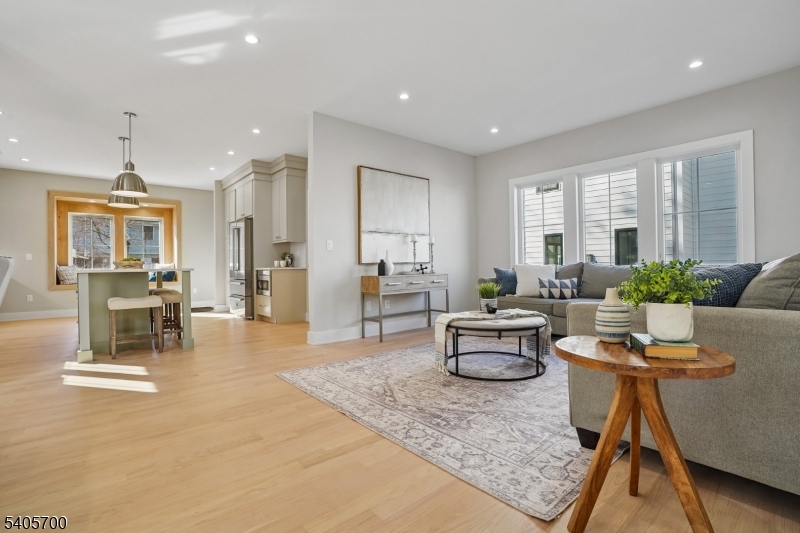 8 Willow Street Millburn, NJ 07041 - Photo 6 of 45 a living room with furniture and a table
