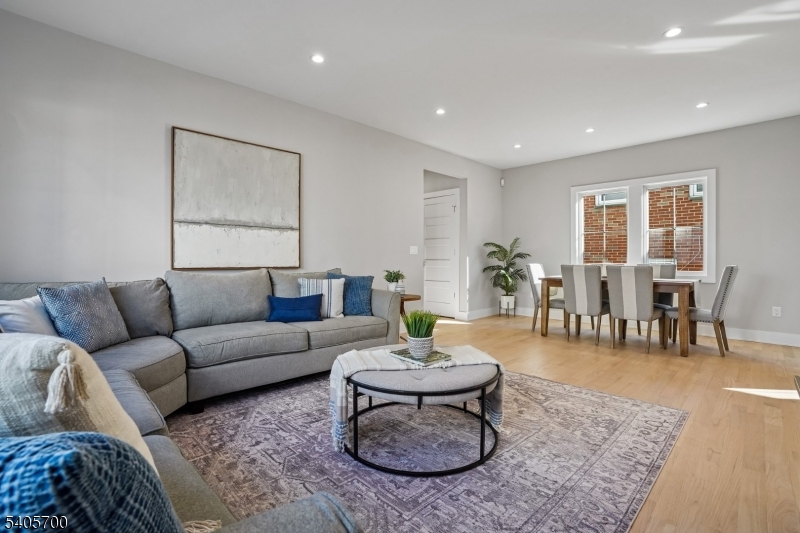 8 Willow Street Millburn, NJ 07041 - Photo 8 of 45 a living room with furniture and wooden floor
