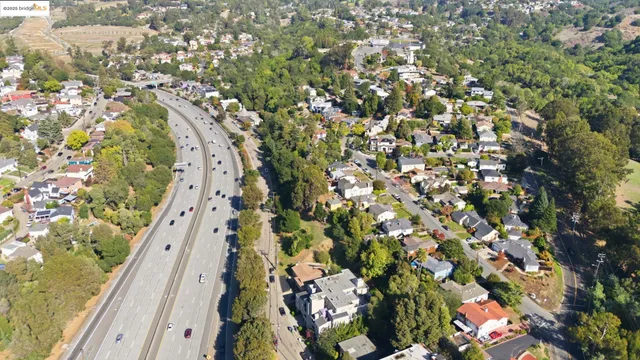 an aerial view of a city with lots of residential buildings