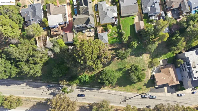 a backyard of a building with lots of green space