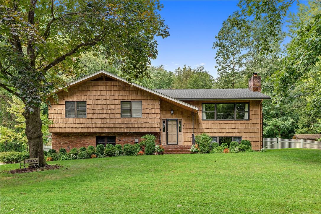 8 Oriole Place Rye Brook, NY 10573 - Photo 1 of 1 a front view of a house with a yard