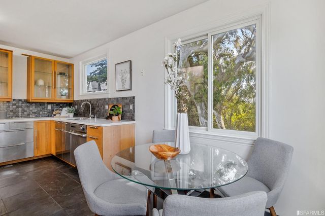 a bed room with a bed and a night stand