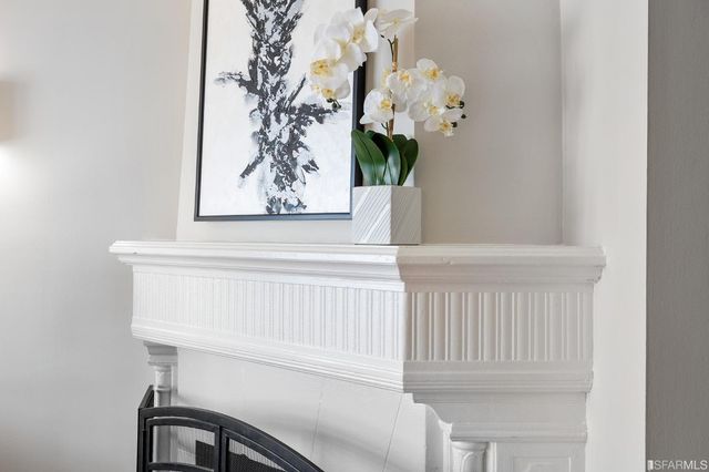 a kitchen with stainless steel appliances granite countertop a sink a stove and cabinets