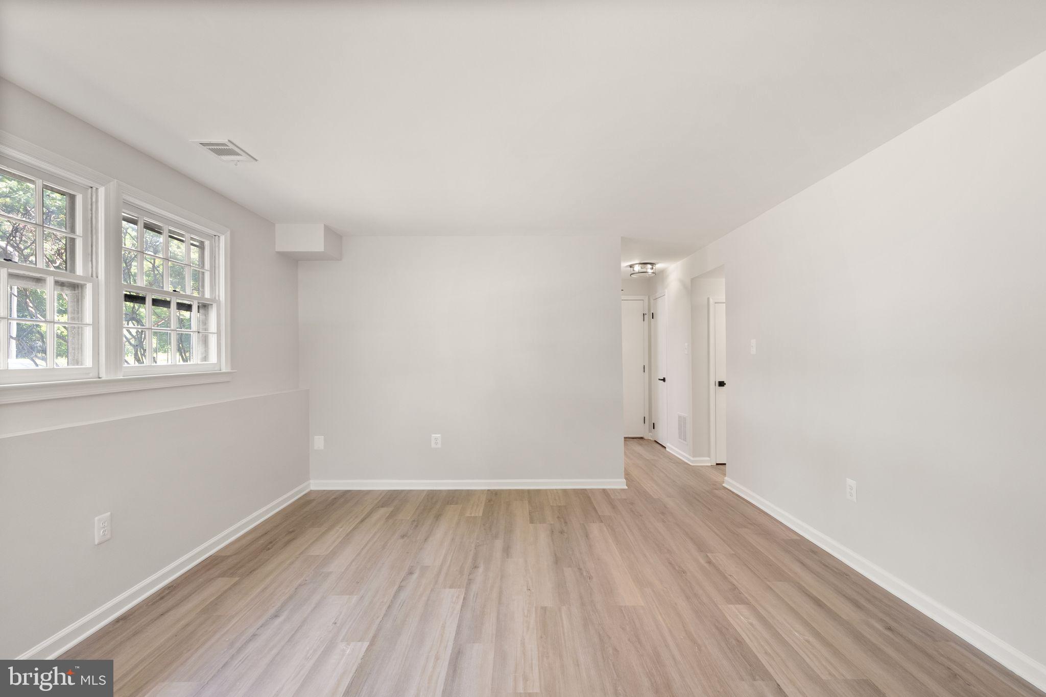 8803 Hayload Court Springfield, VA 22153 - Photo 35 of 49 Lower Level Rec Room w/ Wood Burning Fireplace