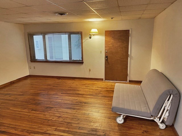 267 Locust Street, Unit 1F Northampton, MA 01062 - Photo 3 of 7 a view of room with window and wooden floor