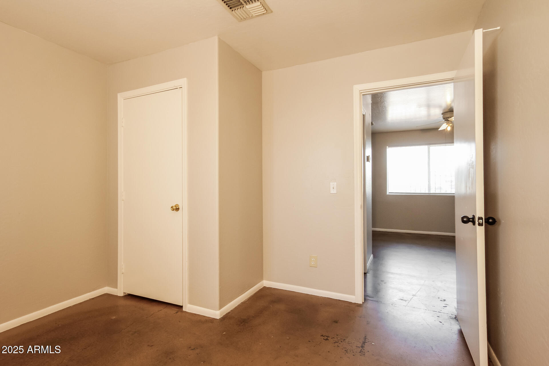 918 South 1st Avenue, Unit 2 Phoenix, AZ 85003 - Photo 10 of 16 a view of an empty room and window