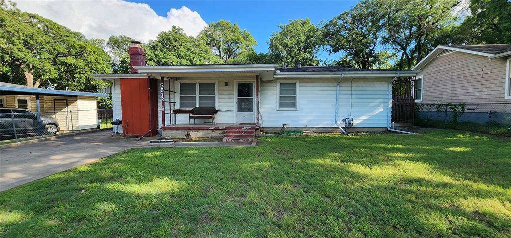 5612 Wainwright Drive Fort Worth, TX 76112 - Photo 1 of 17 a backyard of a house with seating space