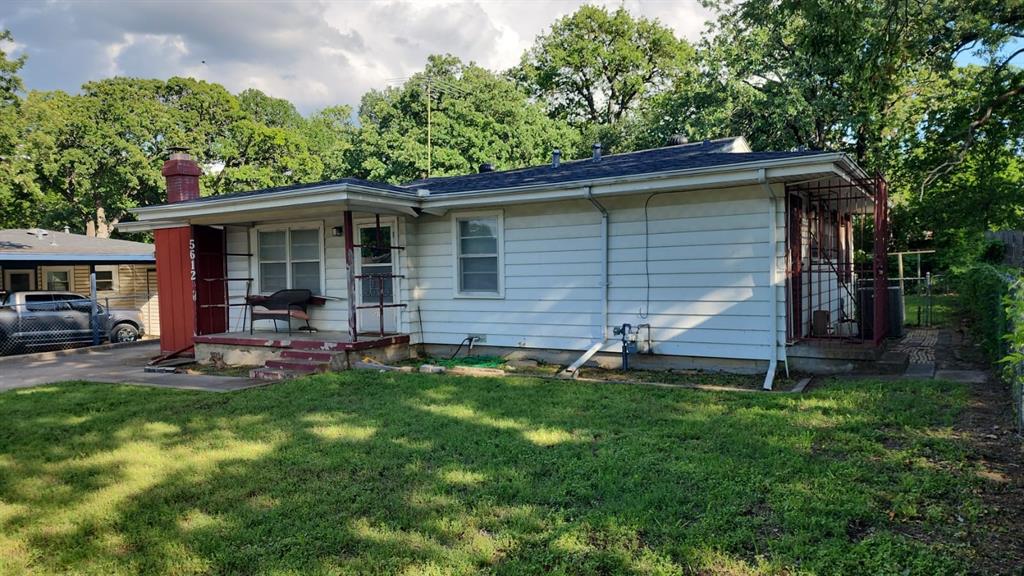 5612 Wainwright Drive Fort Worth, TX 76112 - Photo 2 of 17 a view of a house with a backyard and sitting area