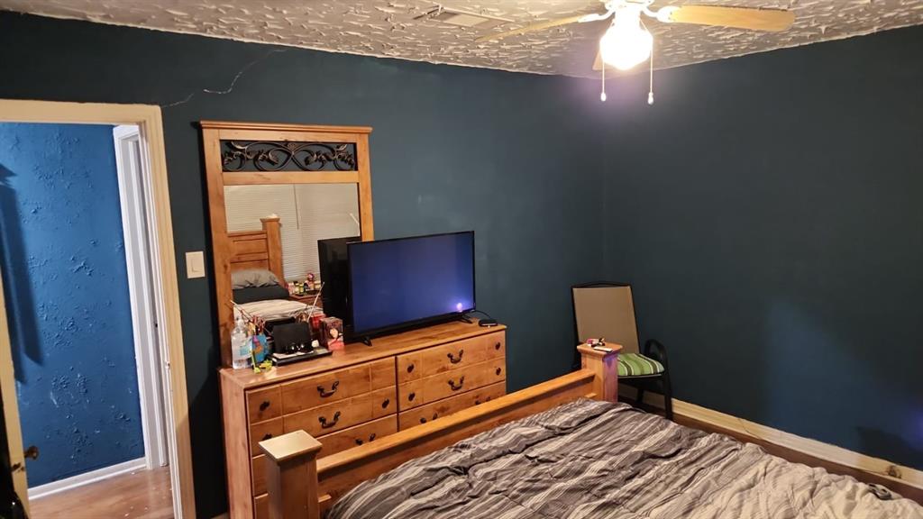 5612 Wainwright Drive Fort Worth, TX 76112 - Photo 8 of 17 a room with storage and utility