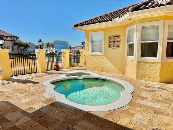 a view of a house with a swimming pool