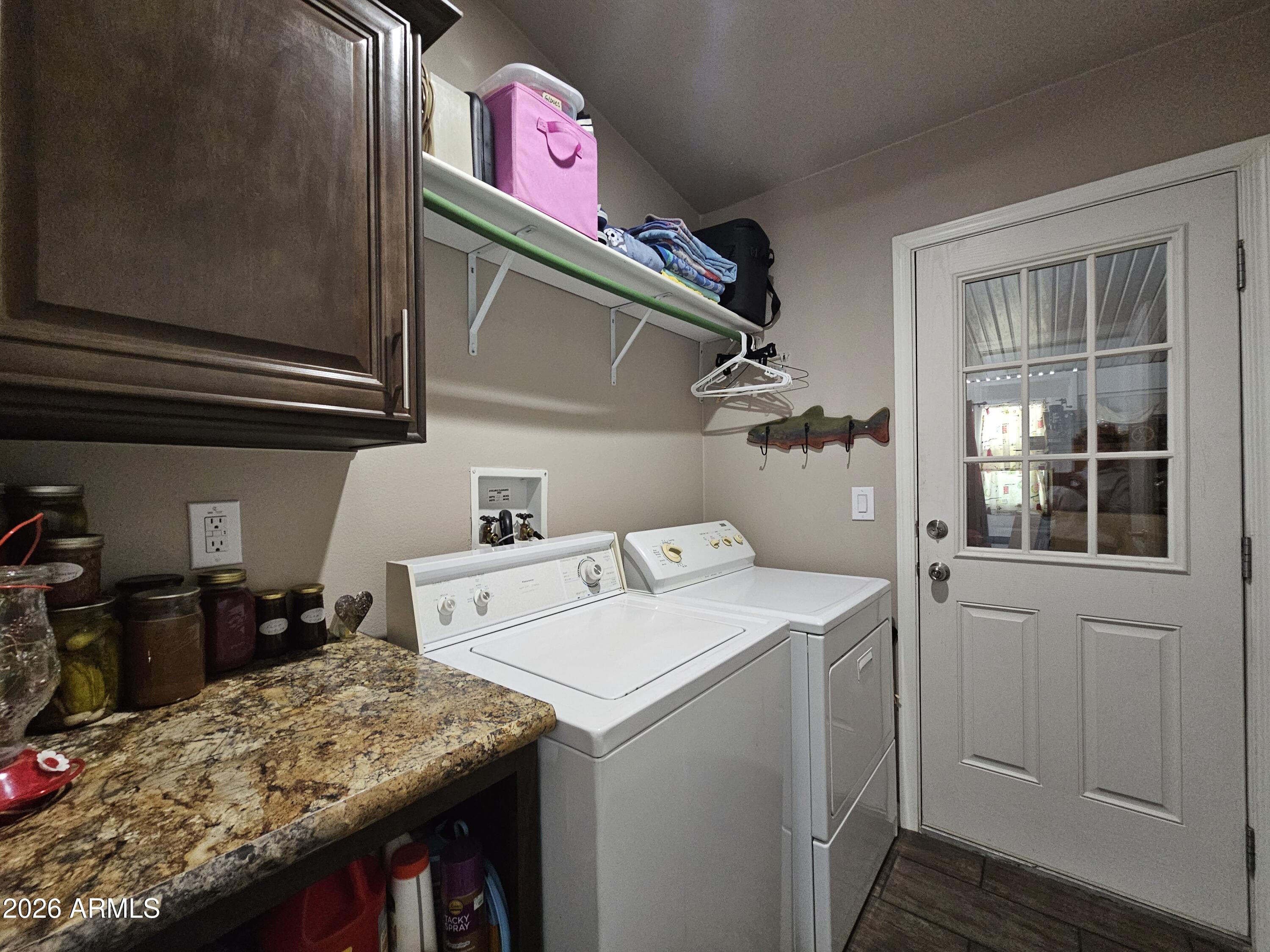 650 North Hawes Road, Unit 3202 Mesa, AZ 85207 - Photo 22 of 35 a utility room with dryer and washer