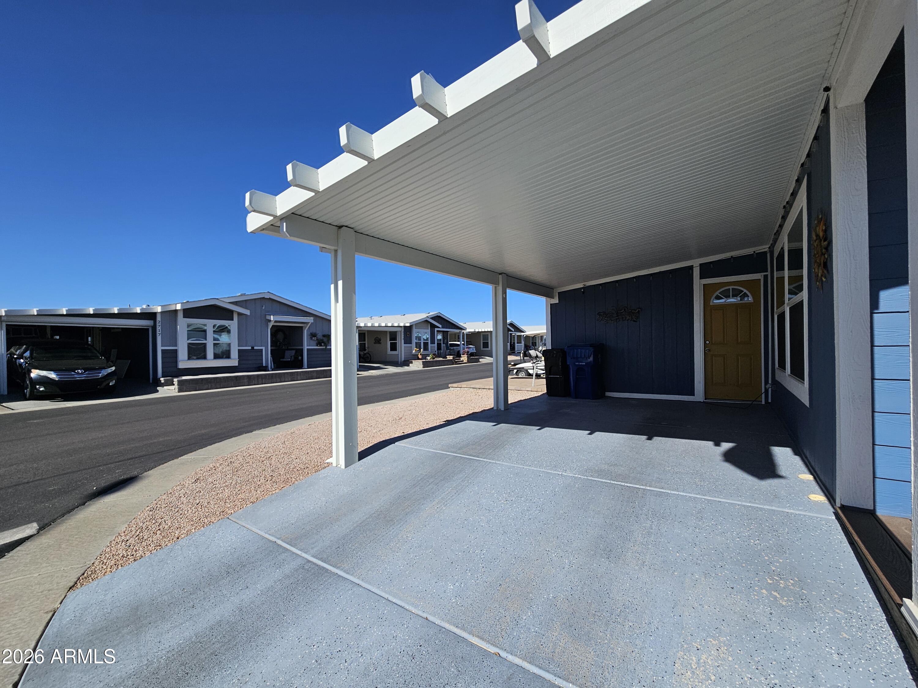 650 North Hawes Road, Unit 3202 Mesa, AZ 85207 - Photo 4 of 35 a view of a car garage
