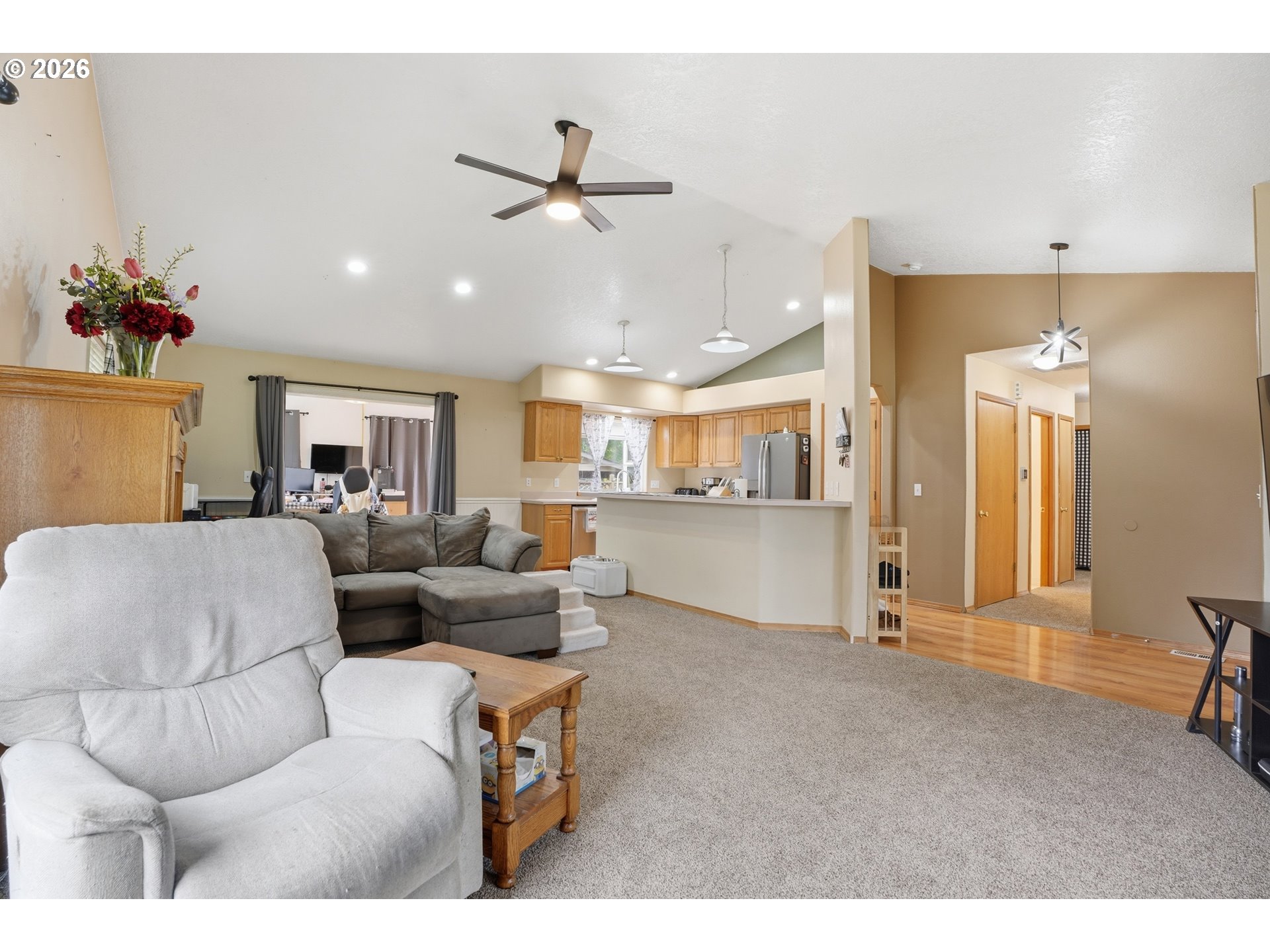 105 Toliver Road Molalla, OR 97038 - Photo 6 of 34 a living room with furniture and kitchen view