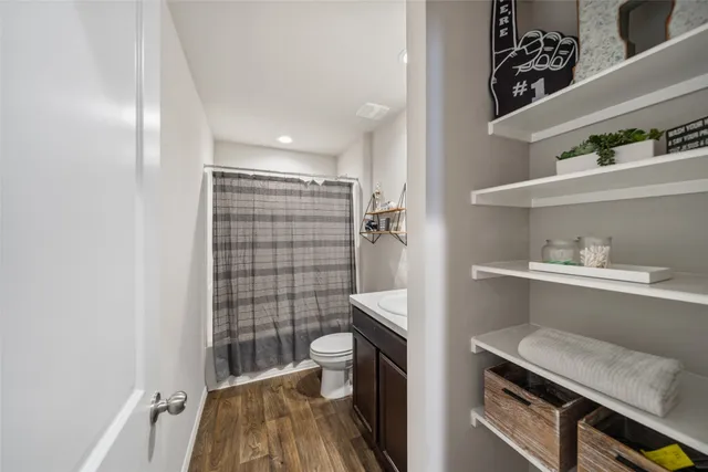 a bedroom with a bed and a closet