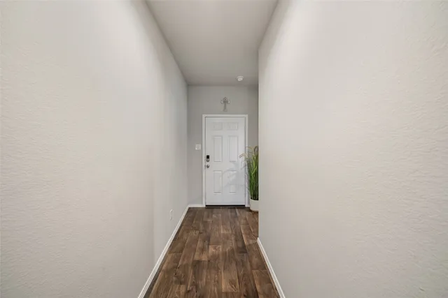 a workspace with furniture and window