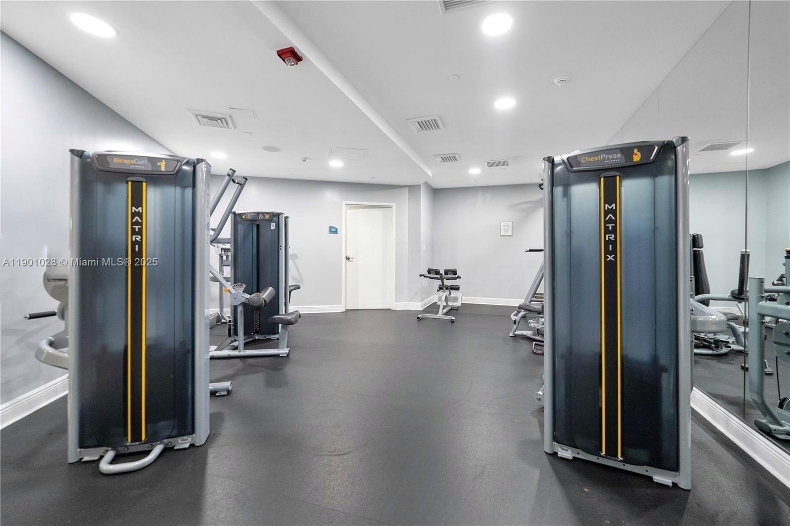 1250 South Miami Avenue, Unit 2201 Miami, FL 33130 - Photo 21 of 30 a view of a hallway with livingroom and furniture