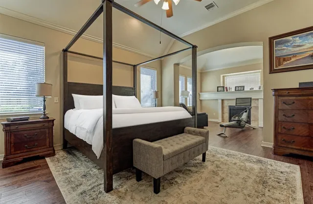 a view of a kitchen with a sink and cabinets
