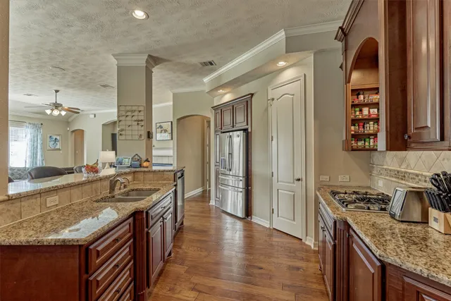 a bathroom with a shower and a sink