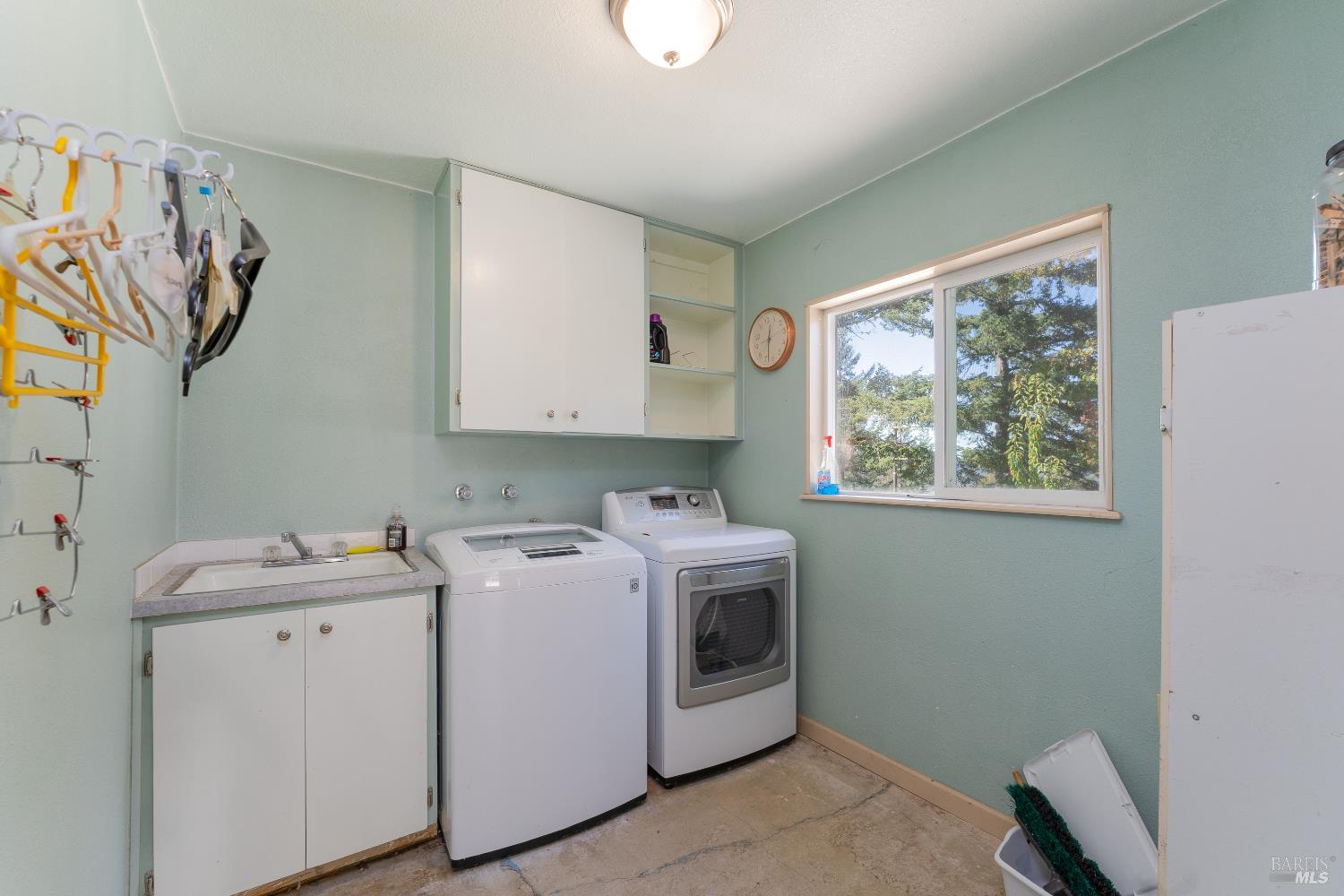3651 Ridgewood Road Willits, CA 95490 - Photo 25 of 46 Detached laundry room with sink and storage space