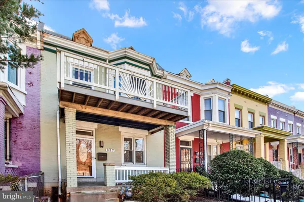 a front view of a multi story residential apartment building