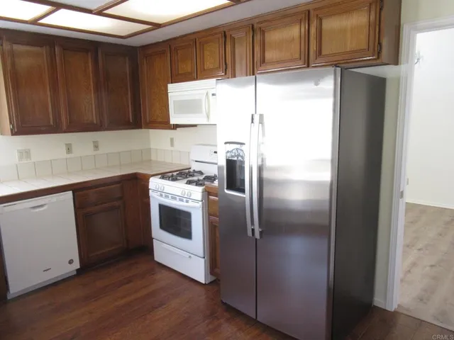 a view of a backyard with plants