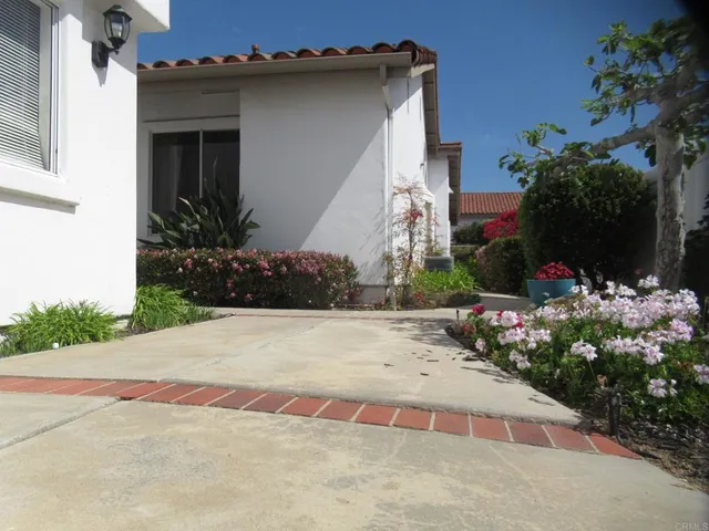 a view of a house with a garage