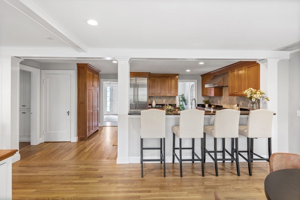 43 Bertwell Road Lexington, MA 02420 - Photo 13 of 41 a view of a dining room with furniture and wooden floor