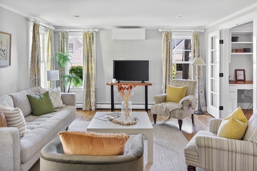 43 Bertwell Road Lexington, MA 02420 - Photo 16 of 41 a living room with furniture and a flat screen tv