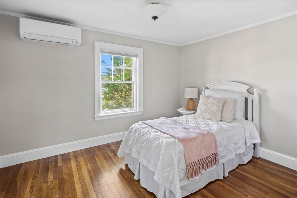 43 Bertwell Road Lexington, MA 02420 - Photo 19 of 41 a bedroom with a bed and a window